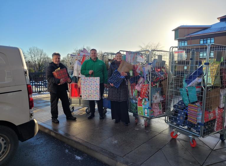 Dunelm staff deliver donated presents for poorly children. 