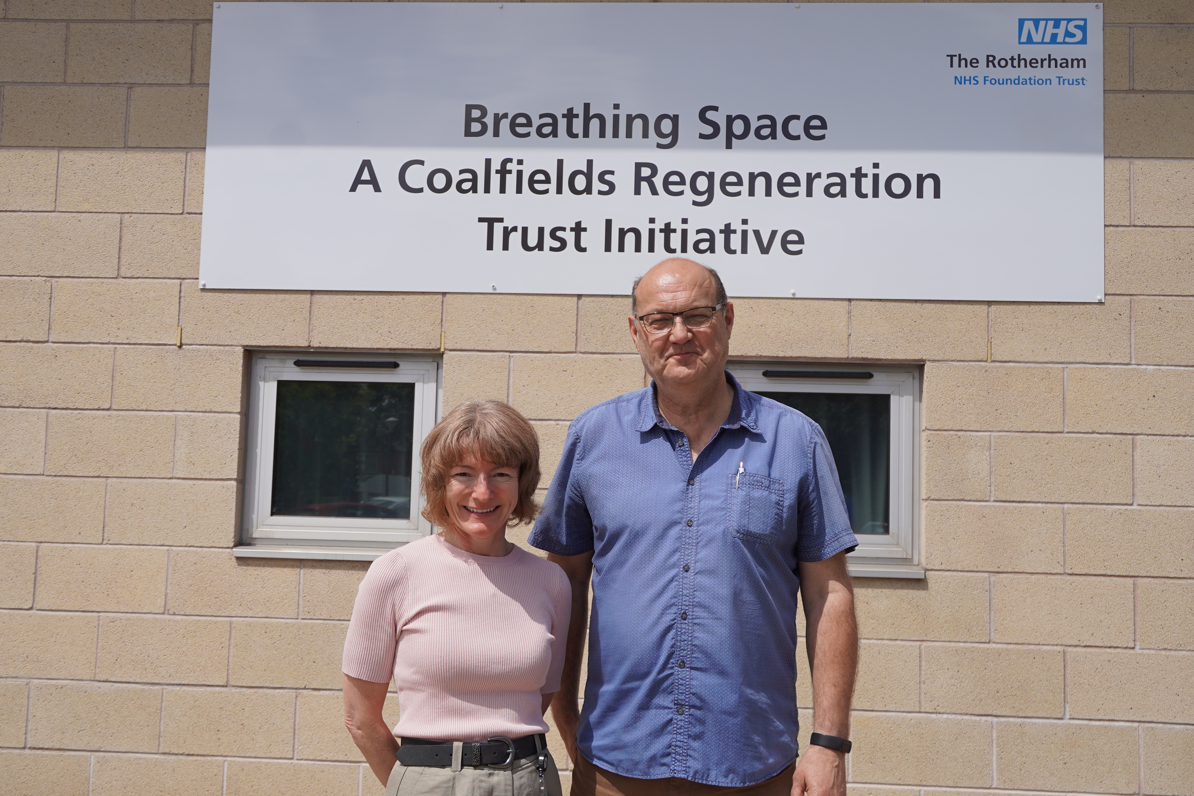 Jacqui Pollington and Asthma Lung UK Trustee Victor Cholij stood together outside BreathingSpace