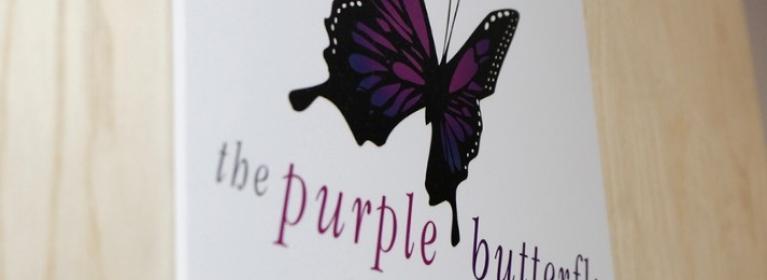 Purple butterfly room signage