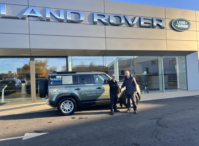 Sytner presenting Land Rover to TRFT Head Gardener