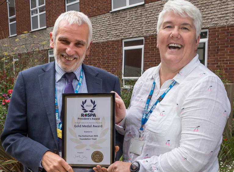 Ian Hinitt and Theresa Thomlinson holding the RoSPA award