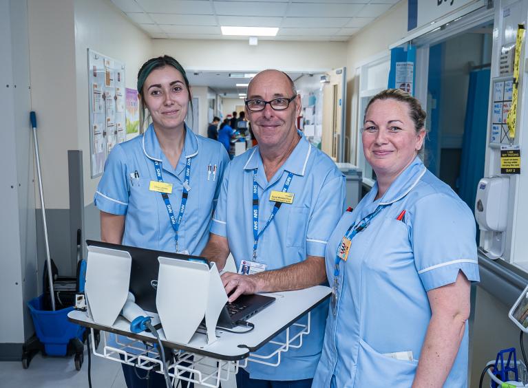 Photo shows three Healthcare Support Workers