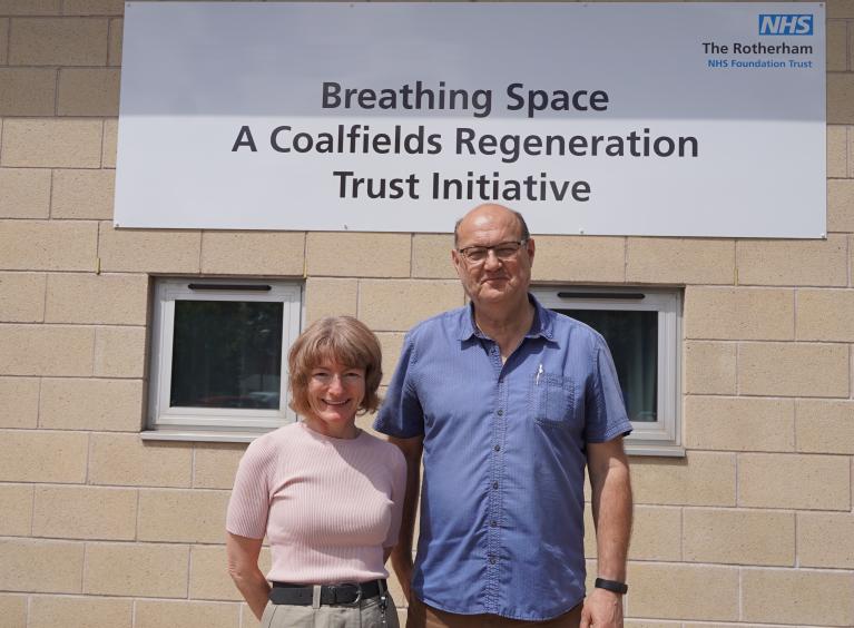 Jacqui Pollington and Asthma Lung UK Trustee Victor Cholij stood together outside BreathingSpace