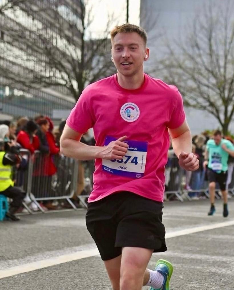 A man running in a marathon for Rotherham Hospital and Community Charity